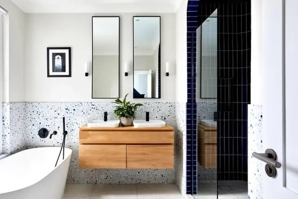 A wall-hung vanity with built-in organisers maximises space in this contemporary bathroom by BetterPAD (BetterPAD/Paul Duffy/Chris Snook/PA)