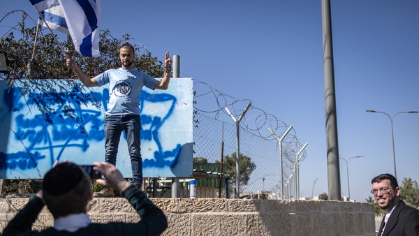 Israeli activists deface sign ouside UNRWA field headquarters in East Jerusalem