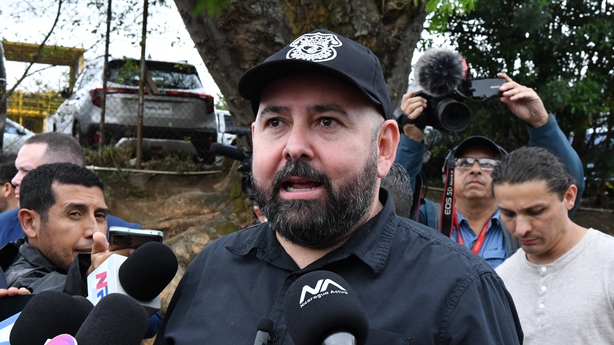 Costa Rica's Vice Minister speaks to reporters ahead of the arrival of migrants