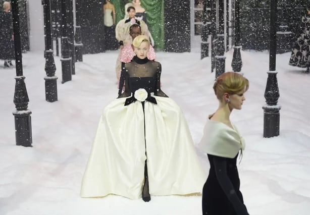 Monotoned silks and velvets took precedence over loud florals this season (Yui Mok/PA)