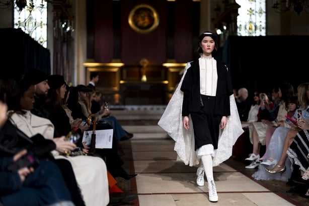 A model on the catwalk during the Bora Aksu show at St Paul's Church Covent Garden central London, during London Fashion Week. Picture date: Friday February 21, 2025.