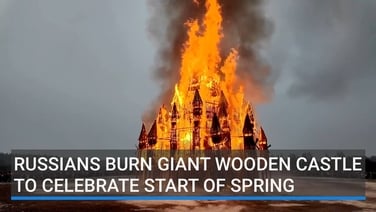 Russians burn giant wooden castle at festival to celebrate start of spring