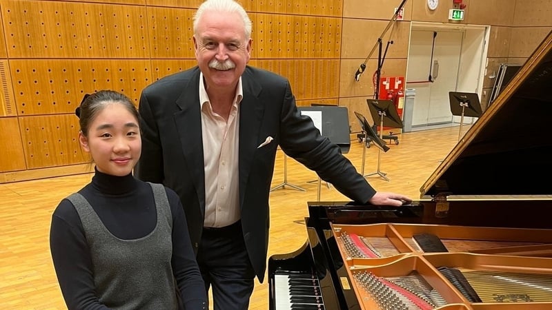 Pianist Ai Lin Sun is with Marty