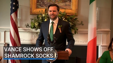 Vance shows off shamrock socks