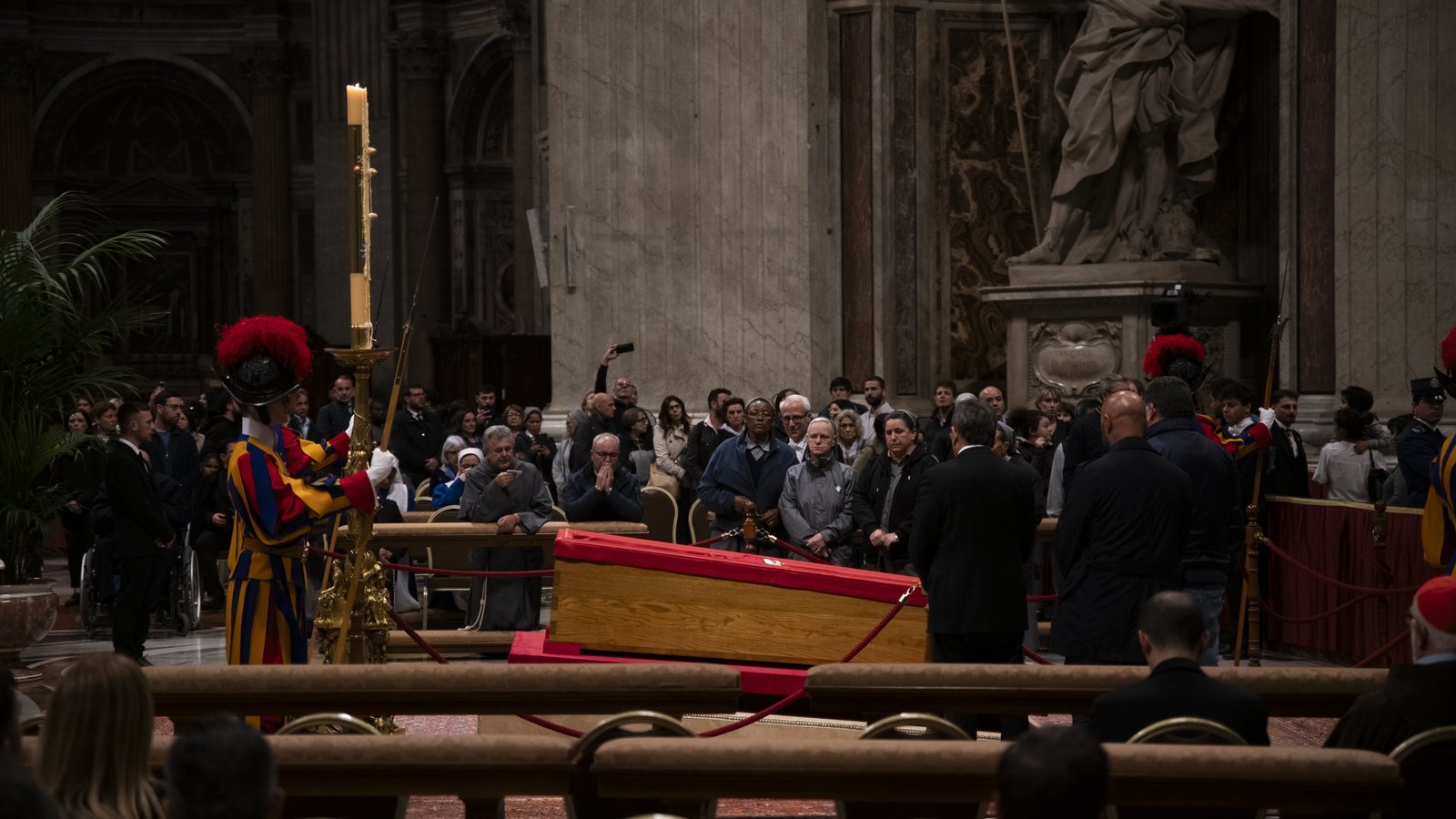 Thousands queue overnight to pay their respects to Pope