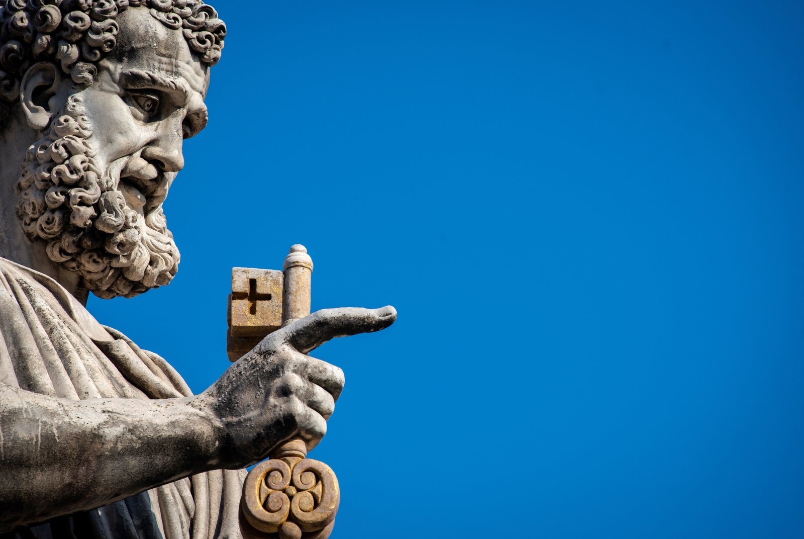 Image - A statue of Saint Peter holding the key of heaven outside St Peter's Basilica