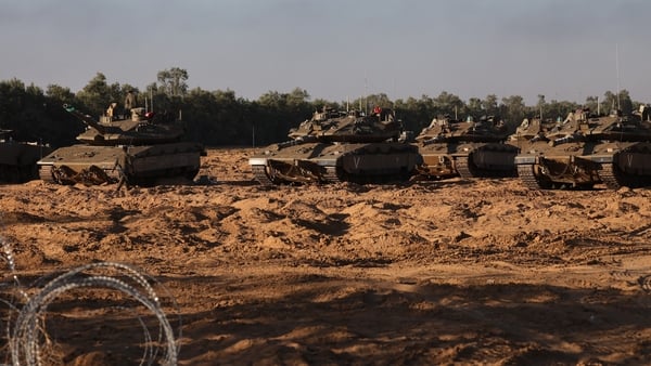 Israeli tanks at a position near Israel's border with Gaza